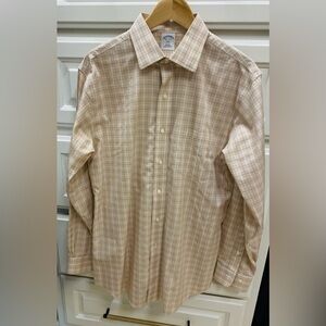 Brooks Brothers Men’s shirt. New without the tag. Slim fit non-iron all cotton